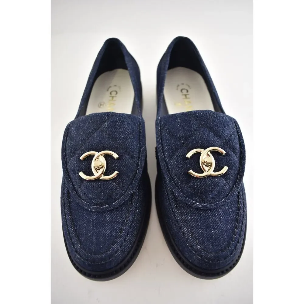 Chanel 24S Dark Blue Denim Quilted Turnlock CC Logo Moccasin Flat Loafer 38c
